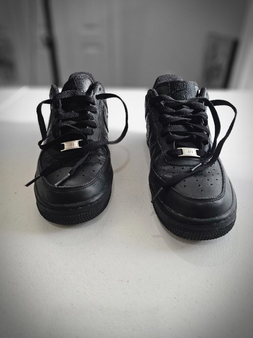 Nike Air Force 1 '07 Triple Black sneakers, men's size 7.5.